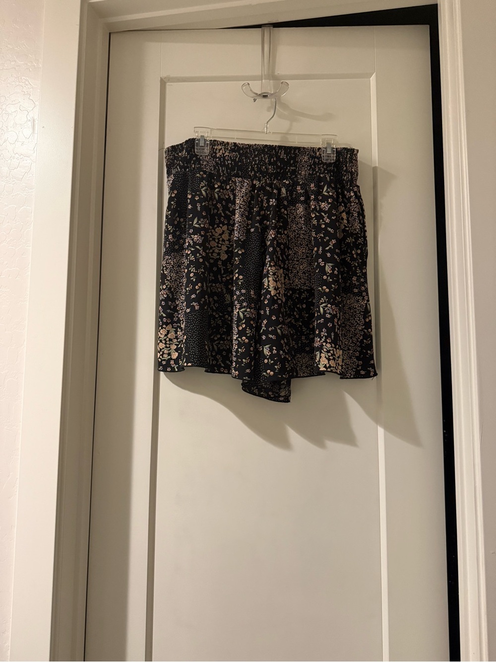 Black Floral shorts that look like a skirt.
